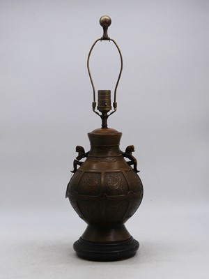 Lot 9 - A Chinese style metal table lamp, in the...