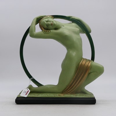 Lot 16 - An Art Deco style plaster figure of a lady,...
