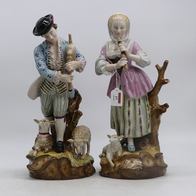 Lot 17 - A pair of porcelain figures, each shown in...