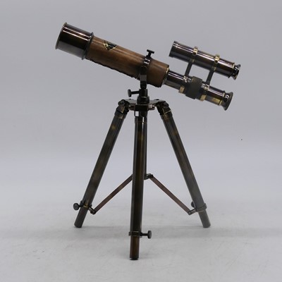 Lot 30 - A reproduction brass telescope, mounted upon a...