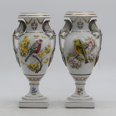 Lot 39 - A pair of porcelain vases, each decorated with...