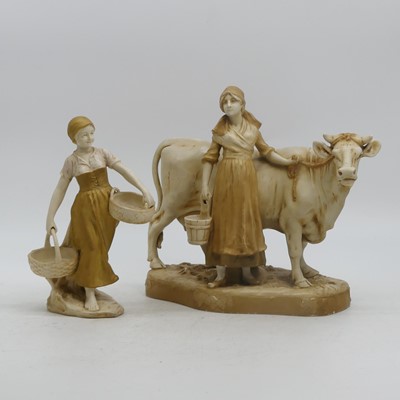 Lot 42 - A Royal Dux figure of a milkmaid beside a cow,...