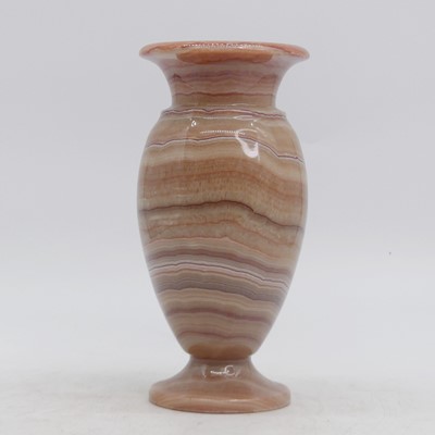 Lot 59 - A polished hardstone vase of ovoid form,...