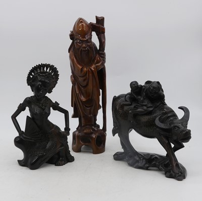 Lot 72 - A Chinese carved hardwood figure group of two...