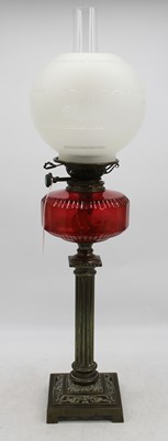 Lot 13 - A Victorian oil lamp, having etched frosted...