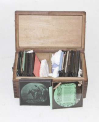Lot 730 - A collection of glass magic lantern slides to...