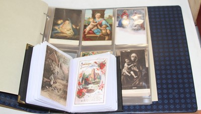 Lot 738 - An album of Edwardian and later postcards...