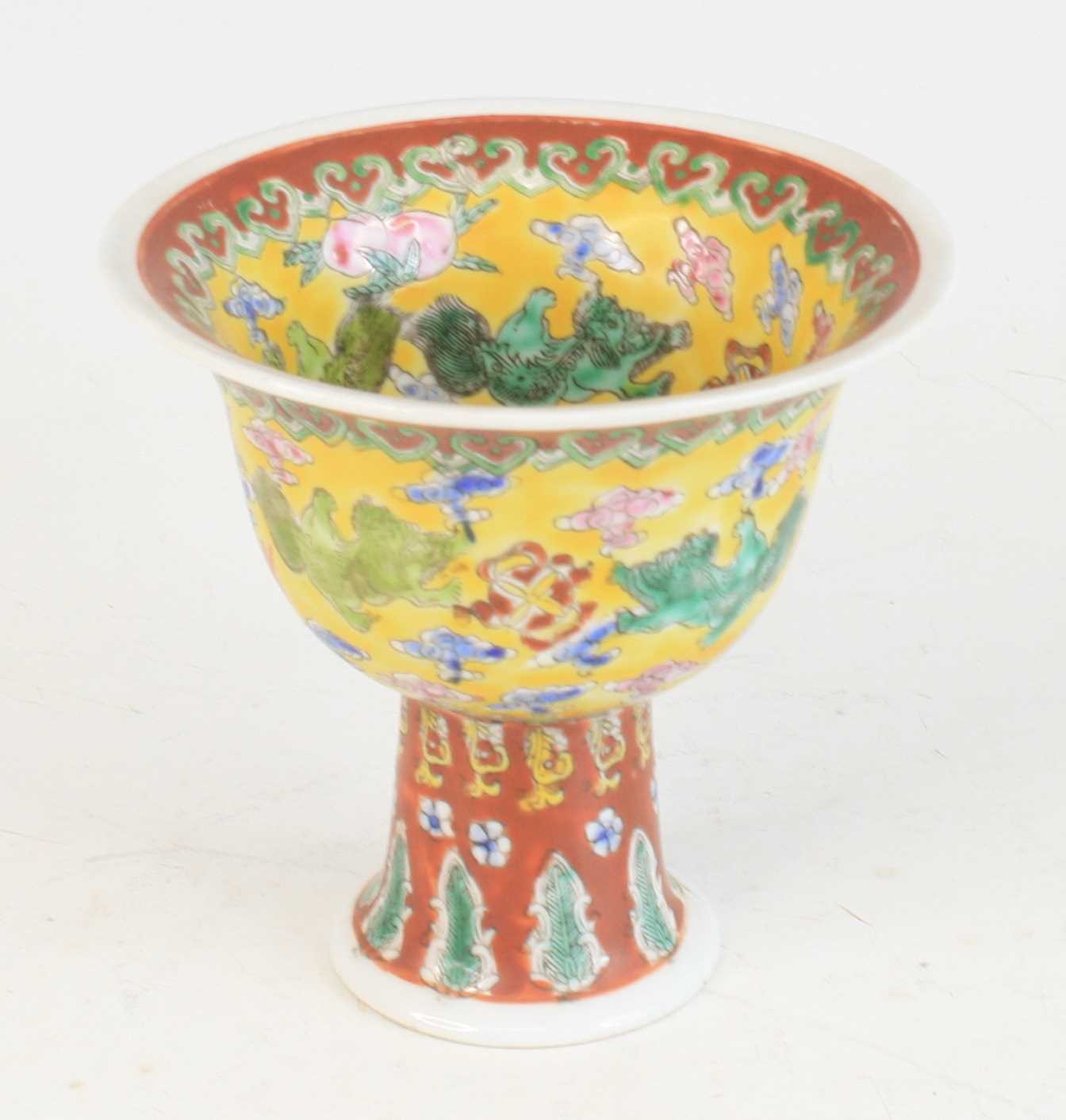 Lot 2057 - A Chinese famille jaune and famille rouge...