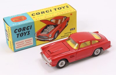 Lot 1002 - Corgi Toys No. 218 Aston Martin DB4, red body,...