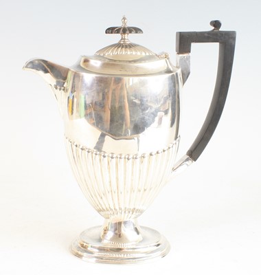 Lot 2137 - A late Victorian silver pedestal coffee pot,...