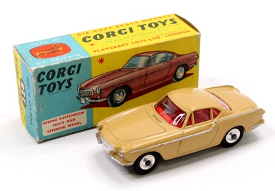 Lot 1018 - Corgi Toys No. 228 Volvo P1800 comprising a...