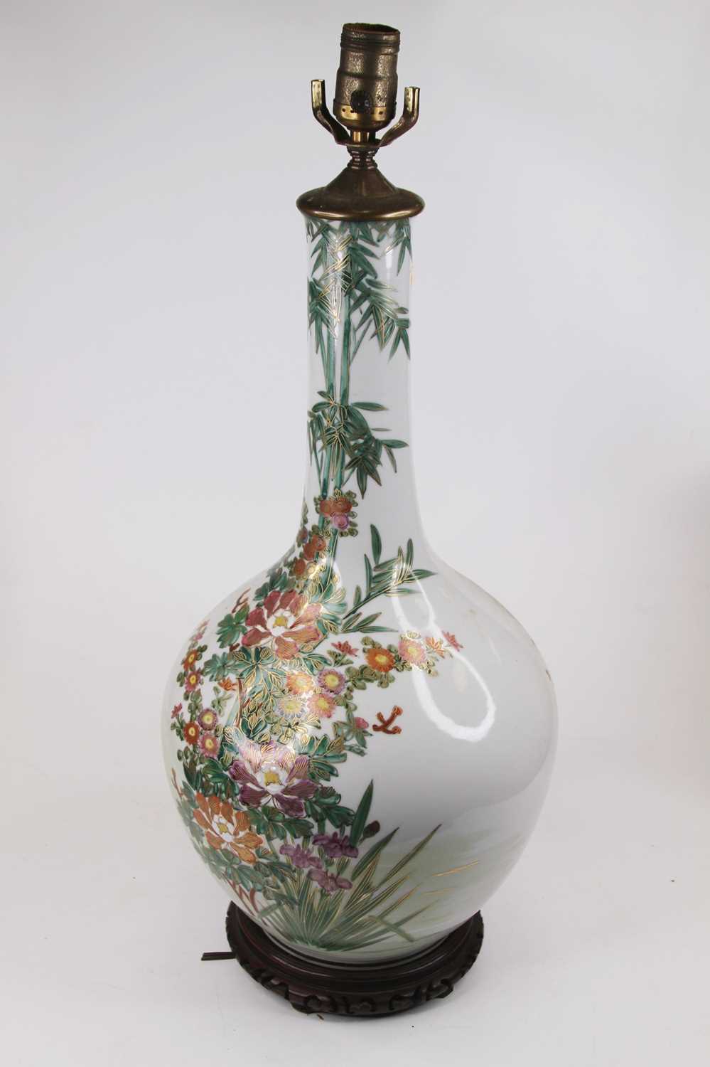 Lot 115 - A large Chinese bottle vase on hardwood stand,...