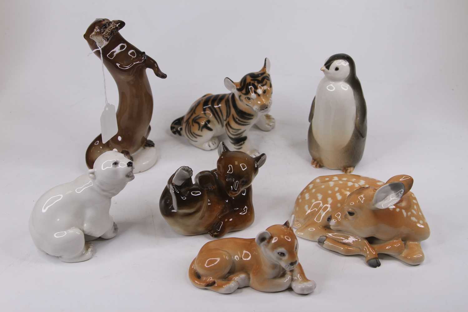 Lot 156 - A Lomonosov porcelain figure of an otter with...