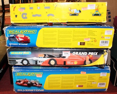 Lot 1596 - Four boxed modern release Scalextric gift sets...