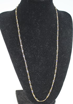 Lot 2271 - A yellow metal multi-stone sapphire necklace,...