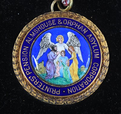 Lot 246 - A silver gilt and enamel jewel for the Printer'...