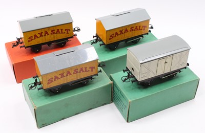 Lot 312 - Four Hornby No.50 goods wagons: three Saxa...