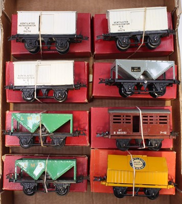 Lot 399 - Eight post-war Hornby 0-gauge 4-wheel wagons:...