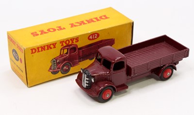 Lot 1393 - A Dinky Toys No. 412 Austin wagon comprising...