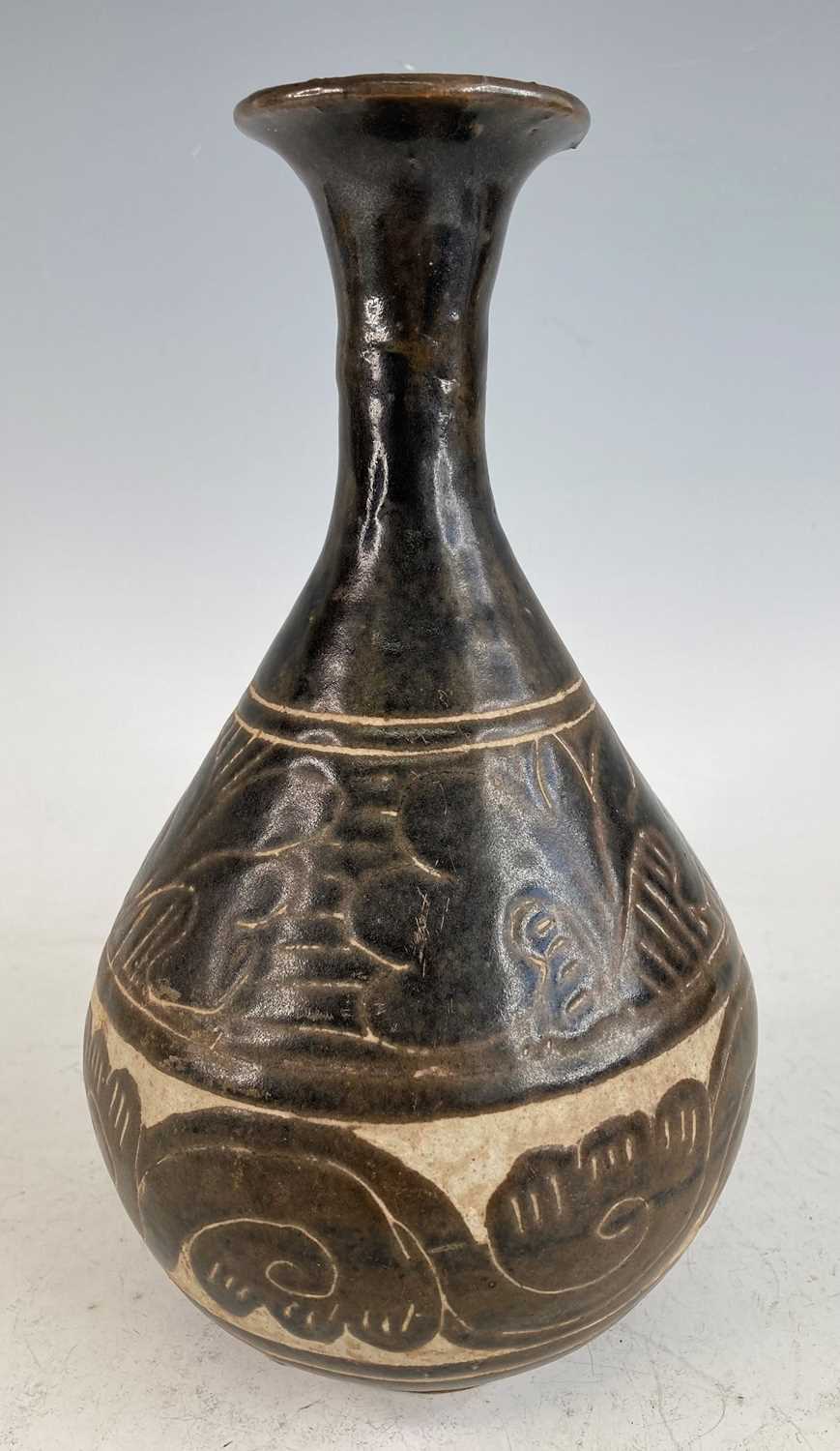Lot 2044 - A Chinese Yuan Dynasty (1271-1368) pottery...