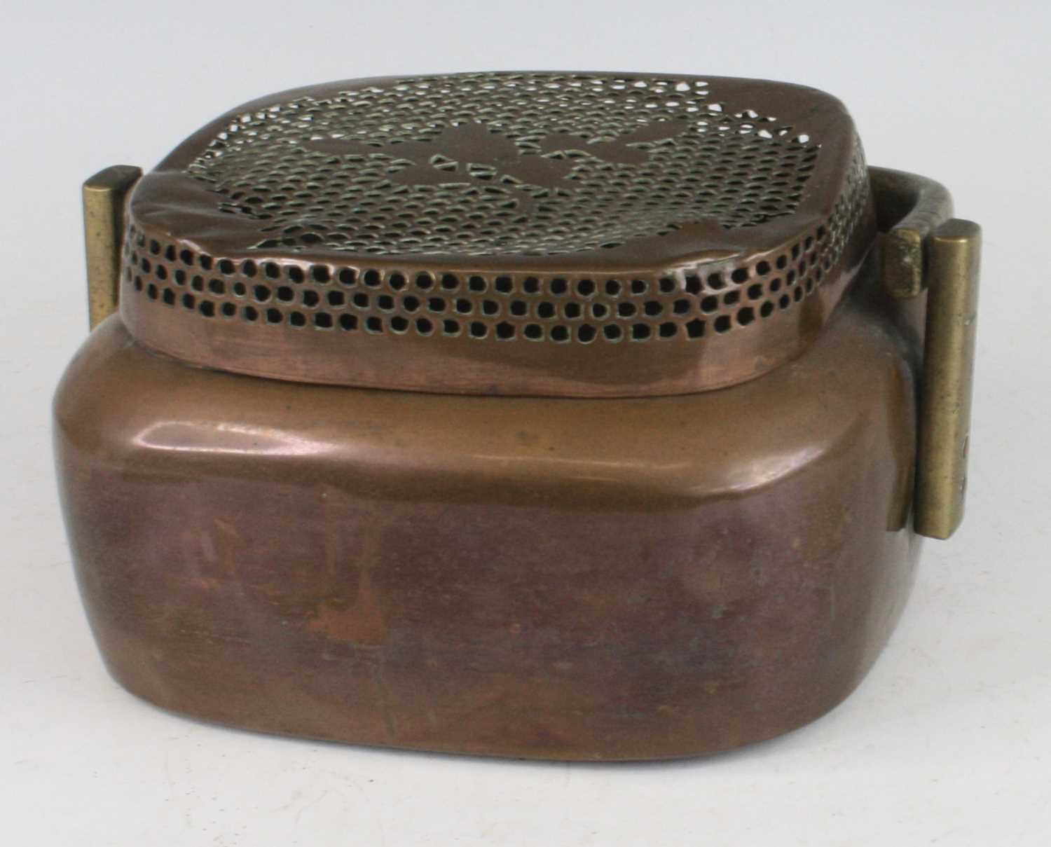 Lot 2084 - A Chinese circa 1900 copper foot-warmer, with...