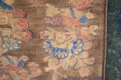 Lot 2326 - A 17th century silkwork appliqué panel, having...