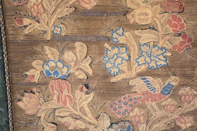 Lot 2326 - A 17th century silkwork appliqué panel, having...