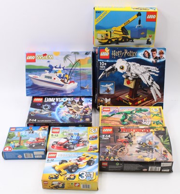 Lot 1845 - A large collection of mixed Lego kits, with...