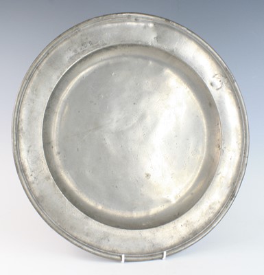 Lot 2340 - An early 18th century pewter charger, having a...