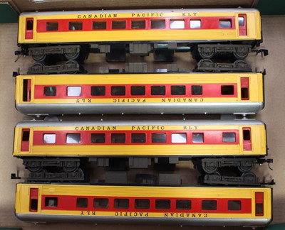 Lot 299 - Four 0-gauge bogie passenger cars yellow & red...