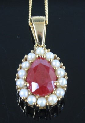 Lot 281 - A 9ct yellow gold, ruby and pearl pear shaped...