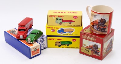 Lot 1477 - A collection of repainted Dinky Toys in...