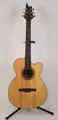 Lot 258 - An Eagle Rose six string acoustic guitar, the...