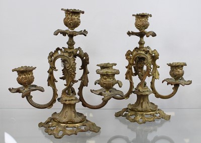 Lot 41 - A pair of gilt metal three sconce table...