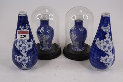 Lot 220 - A pair of Chinese vases in the blue & white...