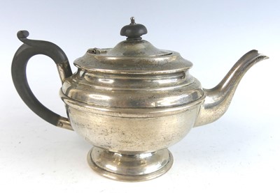 Lot 2164 - A George VI silver teapot, of plain banded...