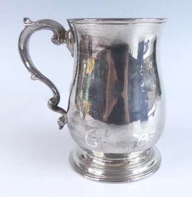 Lot 2128 - A George II silver bell shape tankard, having...