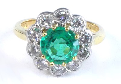 Lot 2247 - An 18ct yellow and white gold, emerald and...