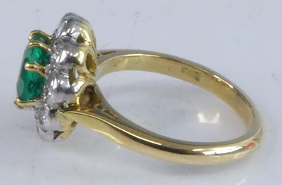 Lot 2247 - An 18ct yellow and white gold, emerald and...
