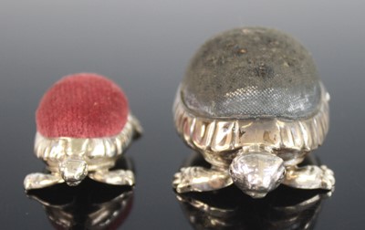 Lot 2199 - Two Edwardian silver novelty pin cushions in...