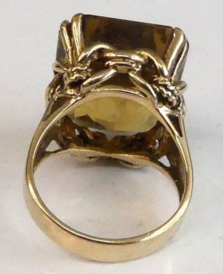 Lot 2505 - A yellow metal citrine dress ring, featuring a...