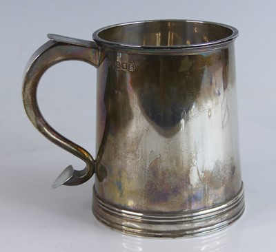 Lot 2179 - A Georgian style silver tankard, of flaring...