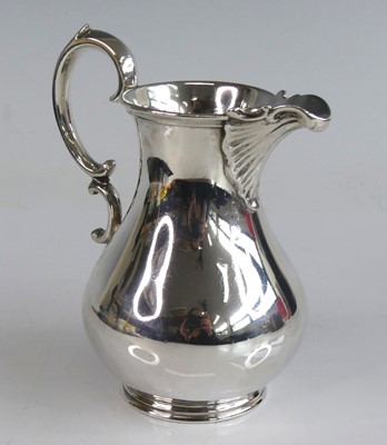 Lot 2153 - A Victorian silver cream jug, the pear shape...