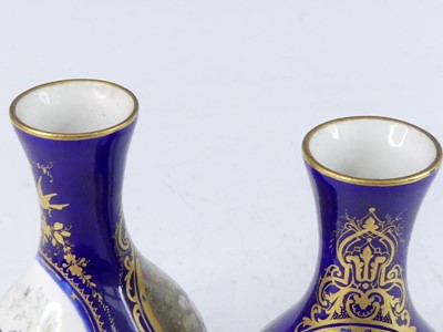 Lot 2082 - A pair of Sevres porcelain vases, 19th century,...
