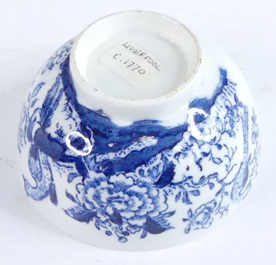 Lot 2052 - A Lowestoft porcelain tea bowl and saucer,...