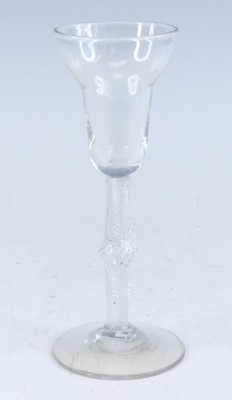 Lot 2113 - A wine glass, circa 1750, the double ogee bowl...