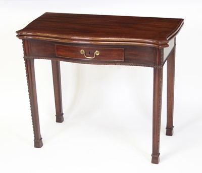 Lot 2523 - A George III mahogany tea table, of serpentine...