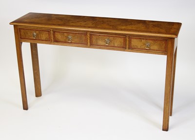 Lot 2504 - An oak and crossbanded four drawer hall table...