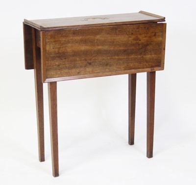 Lot 2493 - A George III mahogany rent table, having a...