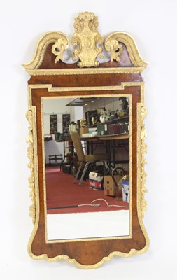 Lot 2557 - A walnut and parcel gilt wall mirror, 19th...